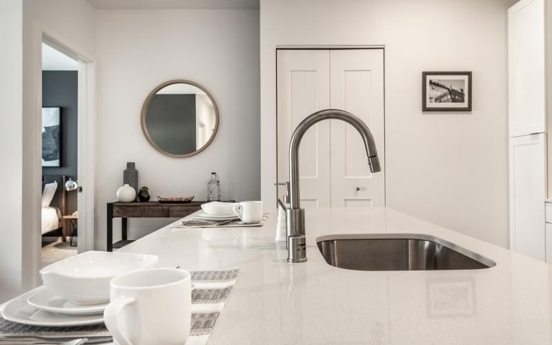 a kitchen counter with a sink